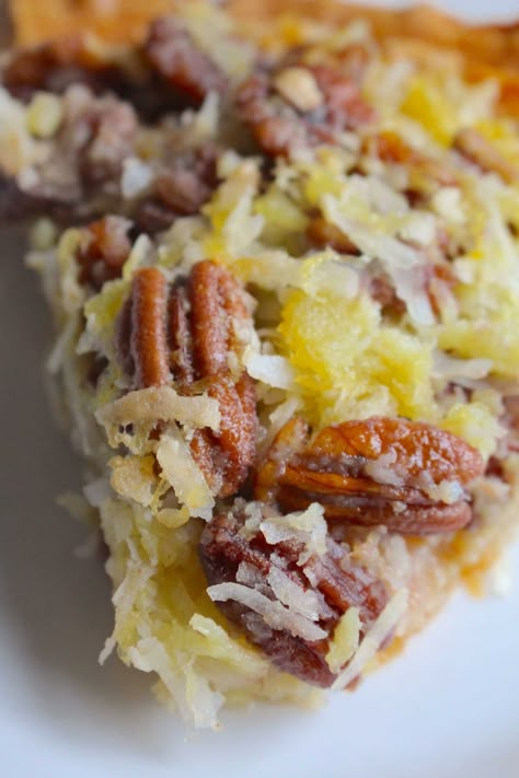 Island Pecan Pie?utm_source=12tomatoes Island Pie Recipe, Tropical Pecan Pie, Island Pecan Pie 12 Tomatoes, Pecan Pie Lasagna, Island Pecan Pie Recipe, Pecan Coconut Pie, Island Pecan Pie, German Apple Pie, Phil Robertson