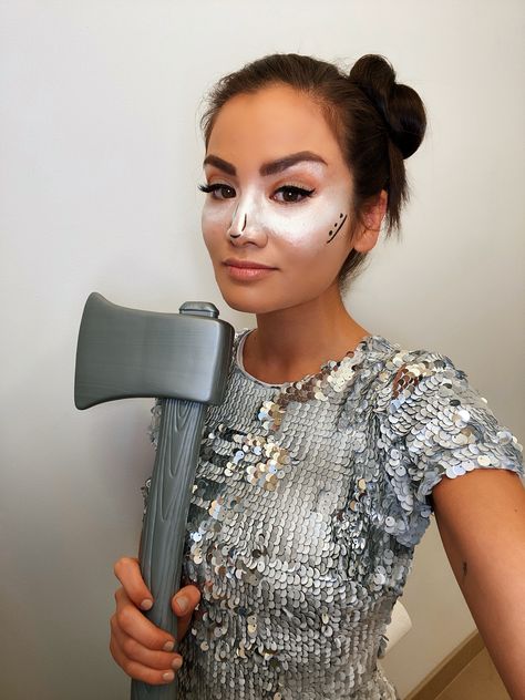 Ready for Halloween? Here is a glam twist to this classic character in Wizard of Oz. A simple axe, red purse as his heart, sparkly silver Dress the Population dress, and funnel hat brings the tin man to life! | Hapa | The Bachelor | Halloween Costume | DIY easy dress up cute makeup | #WithLoveCaila #CailaQuinn Tin Man Face Makeup, Tin Woman Costume Diy, Tinman Makeup Women, Female Tin Man Costume, Tin Man Makeup Wizard Of Oz, Tin Man Halloween Costume Woman, Tin Man Face Paint, Tinman Costume Diy Women, Tin Woman Costume