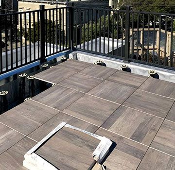 Roof Deck Tiles Ideas - Pros And Cons Of Tile Rooftops, Installing Tips, Best Tile For Rooftop Deck Rooftop Tiles Idea, Tiles For Rooftop, Rooftop Deck Flooring, Rooftop Flooring Ideas, Deck Tiles Ideas, Roof Pics, Rooftop Tiles, Lizard House, Flat Roof Tiles