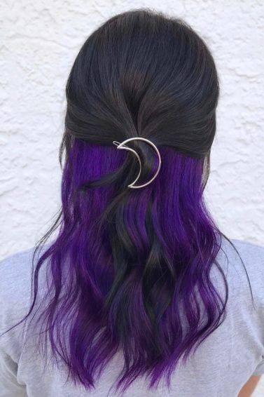 Peekaboo highlights: Women with dark brown hair with purple peekaboo highlights, styled half up with a moon hair accessory Purple Peekaboo Highlights, Purple Peekaboo Hair, Purple Brown Hair, Hidden Hair Color, Peekaboo Hair Colors, Underlights Hair, Peekaboo Highlights, Hair Color Underneath, Peekaboo Hair