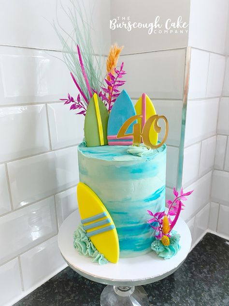 Bright surf themed cake Surfing Theme Cake, Surfer Birthday Cake, Surfing Birthday Cake, Surfs Up Birthday Cake, Surf Cake Ideas, Surfs Up Cake, Pool Theme Cake, Beach Themed Birthday Cakes, Beach Theme Cakes