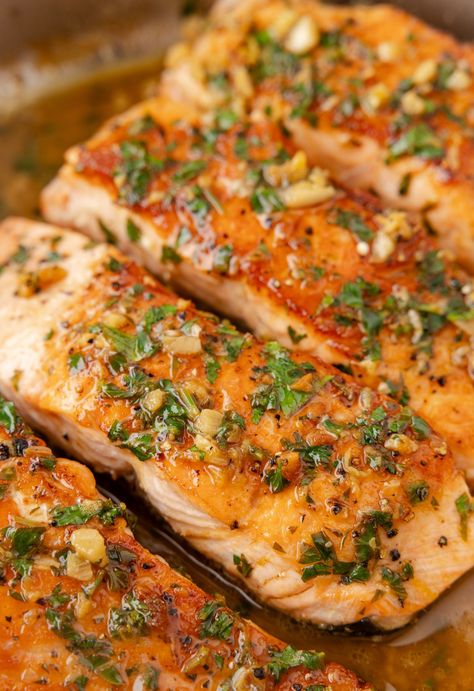 Salmon fillets in a skillet pan with a butter sauce over top Salmon With Skin Recipes, Salmon Filet Recipe, Garlic Lemon Butter Sauce, Salmon Skillet, Salmon Recipe Pan, Sauteed Salmon, Salmon Fillet Recipes, Lemon Butter Salmon, Fish Fillet Recipe