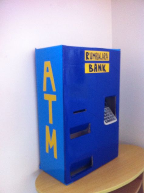 ATM learning bank money Bank Activities For Preschool, Classroom Post Office Dramatic Play, Cardboard Money Bank, Bank Pretend Play, Post Office Dramatic Play Set Up, Toy Money, Financial Literacy Lessons, Classroom Economy, Dramatic Play Themes