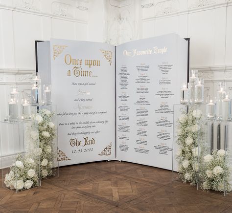 Opulent Wedding Decor | ElegantWedding.ca Fairytale Seating Chart Wedding, Castle Aesthetic Wedding, Fairytale Seating Chart, Disney Themed Wedding Decorations, Disney Wedding Seating Chart, Princess Wedding Theme, Silk Flower Decor, Fairytale Wedding Theme, Reception Seating Chart