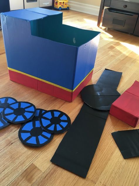 Diy Conductor Costume, Box Train Diy Cardboard, Cardboard Train Diy For Kids, Cardboard Train Diy, Cardboard Box Train, Diy Thomas The Train, Thomas The Train Costume, Train Engineer Hat, Train Engineer Costume