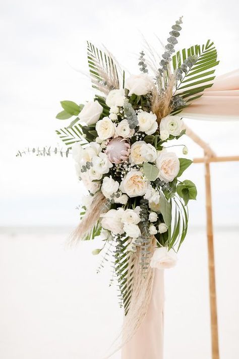 Tropical Beach Inspired Wedding Ceremony Decor, Ivory and Blush Pink Garden Roses, Silver Dollar Eucalyptus, Pink Protea Palm Leaf Floral Bouquet on Bamboo Ceremony Arch | Clearwater Beach Photographer Lifelong Photography Studios Pink Protea, Clearwater Beach Wedding, Florida Destination Wedding, Beach Wedding Decorations Reception, Dollar Eucalyptus, Tropical Wedding Flowers, Beach Wedding Flowers, Beach Pink, Photography Studios