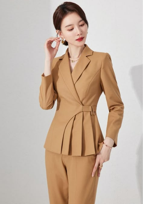 Introducing our Camel Chic Belted Blazer Set. Meticulously tailored to enhance your silhouette, it brings a fresh perspective to power dressing. The single-breasted blazer features a cinched waist and a playful peplum flare, while the smart belt detail adds a modern twist to the classic piece. Paired with comfortable y Blazers Jacket For Women, Ladies Blazer Design, Power Suits For Women, Model Blazer, Ladies Blazer, Stylish Blazer, Blazer Jackets For Women, Fresh Perspective, Stylish Suit