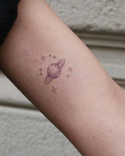 Saturn Tattoo Minimalist, Planet Tattoo, Saturn Tattoo, Inner Arm Tattoos, Tattoo Aesthetic, Planet Tattoos, Small Pretty Tattoos, Discreet Tattoos, Tattoo Feminina