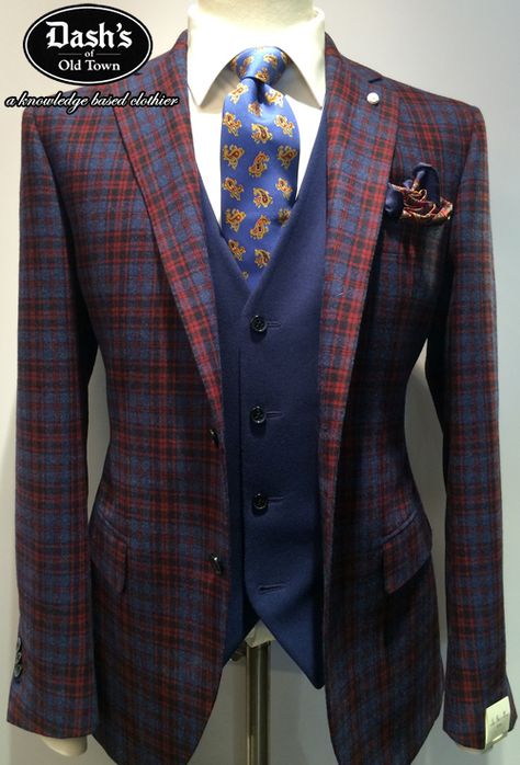 A blue plaid Ariston fabrication sport jacket custom made "Off the Rack" - A new fall creation from Dash's with "cool" red plaid and black accents! A great look for the boardroom - if you're the majority shareholder, if you will and a fantastic seasonal look for years to come! Paired with a complementary vest to tone down the red and play up the blue and with a plain white shirt. The blue tie speaks for itself with the right palette and scale as the pocket square is played down. Canada Goos, Mens Tweed Suit, Plain White Shirt, Tartan Men, Classy Suits, Blue Vest, Plaid Suit, Sport Jacket, Fashion Suits For Men