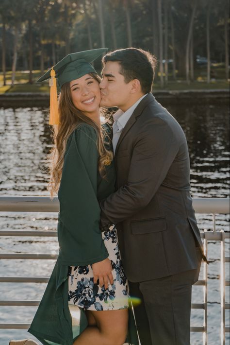 green, gold, congratulations, student, kiss Graduation Picture With Husband, Graduation Pictures With Partner, Couple Convocation Photo, Grad Photos With Boyfriend, Graduation Pictures With Husband, Manifesting Graduation, Graduation Couple Photoshoot, Graduation Pictures With Boyfriend, Grad Photoshoot Ideas High Schools