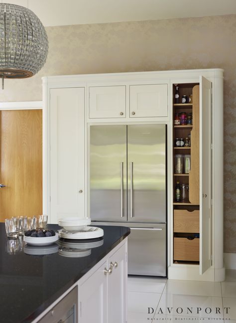 An alternative to a freestanding pantry, these larder cupboards that surround the fridge/freezer provide extra storage that seamlessly integrates in the room. Bathroom Arrangement, Kitchen Pantry Cupboard, Pantry Cupboard, Built In Cupboards, Kitchen Pantry Design, Kitchen Cabinets Decor, Kitchen Pantry Cabinets, Kitchen Room Design, Pantry Design