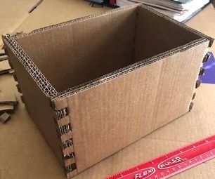 Box Jointed Cardboard Box Diy Cardboard Storage Box With Lid, Cardboard Box Nightstand Diy, Diy Models Projects, How To Make Box Out Of Cardboard, Cardboard Box Upcycle, Painting Cardboard Boxes, Diy Box Storage, Cardboard Furniture Design, Cardboard Box Storage