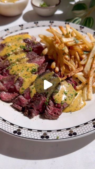 Nadia Aidi on Instagram: "Steak Frites & Béarnaise for ep.5 of my restaurant series. Comment ‘STEAK FRITES’ and I’ll DM you the full recipe with tips & subs! Otherwise scroll down for the condensed version. 
This was the first sauce I learned to cook while working in the industry.
 I’ve taken some liberties with the Bernie clearly…but I love it this way!

* 1 shallot (brunoise).
* 2-3 yolks.
* 2.5 tsp red wine vinegar.
* 2.5 tsp white wine.
* 1.5 tbsp fresh tarragon
* 1 tbsp fresh chives (more for topping).
* 8 oz unsalted melted butter.
* 1 tsp dried tarragon.
* 2 squirts tabasco.
* 1/4 tsp white pepper.
* Salt & Black pepper to taste.
* 2-4 ribeyes.
* 4 russet potatoes.
* Neutral oil for frying the potatoes.

Directions:
1. Peel the potatoes and cut to desired thickness for the fries. So Steak And Fries Dinner, Steak And Fries, Steak Frites Recipe, Steak Frites, Steak Fries, Russet Potatoes, Fresh Chives, Steak Recipes, Learn To Cook