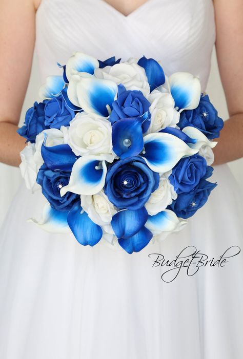 This stunning brides bouquet is hand held bouquet with a mixture of royal blue and white roses with jewel centers accented with royal blue halo and royal blue calla lilies This bouquet is approx 12 inches wide Wedding Flowers Cheap, Blue And White Roses, Blush Bouquet Wedding, Wedding Stills, Budget Bride, Purple Wedding Theme, Brides Bouquet, Blue Wedding Flowers, Bridesmaid Flowers