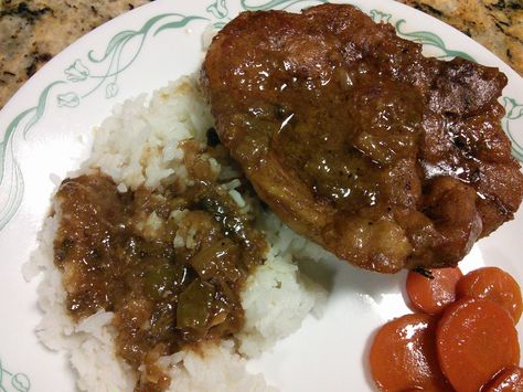 A blog about cooking and family featuring recipes and tips with a Southern and Cajun twist. Pork Chop Rice And Gravy Recipes, Louisiana Rice, Pork Chops Rice, Recipes Using Pork, Pork Chops And Rice, Rice And Gravy, Pork Steaks, Pork Chops And Gravy, Easy Pork Chops