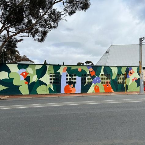 Cécile Gariépy on Instagram: "My first public art piece in Australia now lives its life in the city of Mitcham — YAY 🥹! This church wall has unfortunately heard a lot of swear words, as the wall was rain-damaged a few weeks ago (see last photo for a glimpse of the nightmare). I had to sand down some parts back to the bare concrete and repaint all over again. Thanks a lot to everyone who has helped with this, in real life but also on the World Wide Web ✨. And in case anyone wondered, spreading m Reban Ayam, City Mural, Life In The City, Wall Street Art, Swear Words, Cafe Wall Art, Sidewalk Art, School Murals, Colorful Murals