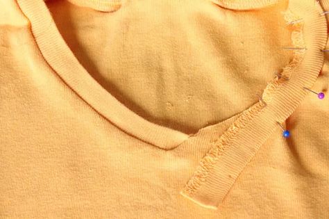 Step-by-Step Tutorial for Turning a Crew Neck T-Shirt Into a V-Neck | ehow T Shirt Refashion, Umgestaltete Shirts, Altered T Shirts, Shirt Makeover, Recycled Clothes, Cut Off Shirt, Swiss Miss, Sewing Alterations, Upcycle Shirt