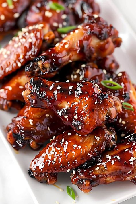 These honey glazed chicken wings are the perfect appetizer or main dish. Coated in a sticky, sweet and savory honey-soy glaze, they're finger-lickin' good! Honey Glaze Chicken Wings, Gojuchang Wings, Gourmet Chicken Wings, Chicken Wing Glaze, Thanksgiving Chicken Wings, Honey Glazed Chicken Wings, Sticky Asian Chicken Wings, Honey Chicken Wings Recipe, Glazed Wings