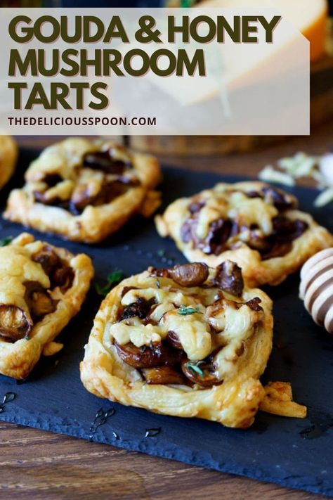 Mushroom Tarts covered in bubbling Gouda and drizzled with honey in puff pastry pillows. The perfect appetizer to ring in the new year or to accompany a celebration with family and friends!#mushroomtartlets #mushroomtartrecipes #mushroomtartsappetizer #mushroomtartpuffpastry #appetizerrecipes #appetizersnacks Pastry Truck, Mushroom Tarts, Honey Mushroom, Puff Pastry Recipes Appetizers, Pastry Bites, Savory Puff Pastry, Pastry Puff, Mushroom Tart, Puff Pastry Appetizers