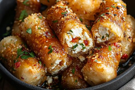 Oven Fried Feta Rolls with Chili Honey Feta Cheese Uses, Feta Rolls With Chili Honey, Fried Feta With Honey, Oven Fried Feta Rolls With Chili Honey, Oven Fried Feta Rolls, Savoury Christmas Snacks, Fried Feta Rolls, Salty Snacks For Party, Recipes With Feta Cheese