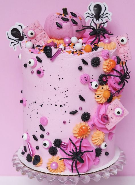 20+ Halloween Cake Inspirations for a Truly Spooky Season Cute Halloween Birthday Cake, Pink Halloween Cupcakes, Pink Halloween Birthday Cake, Halloween Buttercream Cake, Halloween Birthday Cupcakes, Pastel Halloween Cake, Halloween Bday Cakes, Pink Halloween Cake, Spooky Birthday Cake