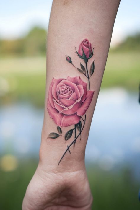 Delicate Pink Rose on the Wrist Pink Roses Tattoo, Pink Tattoo Ideas, Rose Tattoo Color, Pink Rose Tattoo, Flower Tattoos Rose, Rose Bud Tattoo, Coloured Rose Tattoo, Pink Flower Tattoos, Tattoo On The Wrist