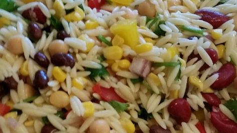 A Mexican-inspired cold pasta salad features orzo, chickpeas, black beans, cilantro, and lime juice for a refreshing, colorful meal. Mexican Orzo, Orzo Salads, Orzo Salad Recipes, Tomato Avocado, Orzo Recipes, Cold Pasta Salad, Orzo Salad, Cold Pasta, Refreshing Food