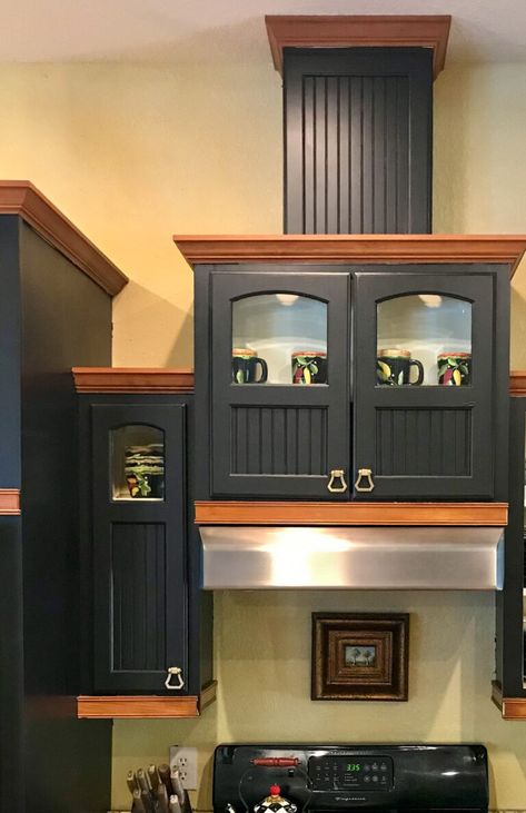 black painted kitchen cabinets Painting Cabinets Black, Black Painted Kitchen Cabinets, All In One Paint, Painted Kitchen Cabinets, Heirloom Traditions Paint, Heirloom Traditions, Painted Kitchen, Black Cabinets, White Kitchen Cabinets