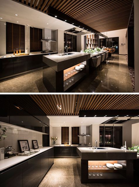 This long and modern kitchen island is home to a bar, a six person dining table and a food prep area. #KitchenIsland #ModernKitchen Narrow Kitchen Layout, Kitchen Luxury Design, Popular Kitchen Colors, Long Narrow Kitchen, Dapur Rustic, Kitchen With Long Island, Model Dapur, Small Ideas, Long Kitchen