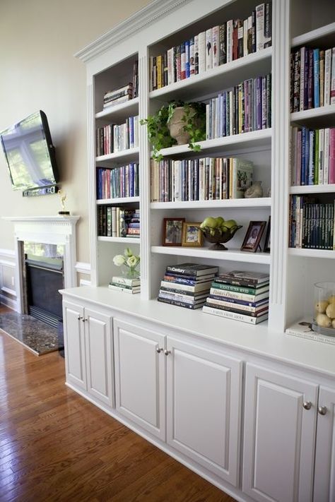 Library Storage Cabinet - Foter Books On Built Ins, Book Shelves With Cabinets Below, Living Room Cabinet Hardware, Bookshelf With Cupboards, White Library Shelves, Partial Wall Built Ins, Book Cabinet Design, Book Shelves In Living Room, Room Bookshelf Ideas