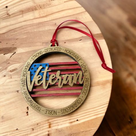 We are a veteran owned, small business. 
Wood is Basswood with acrylic paint. Wood is sprayed with sealant for protection. Find this ornament and more in our Etsy shop. Veterans Appreciation Gifts, Veteran Gifts Diy, Veteran Gifts, Veterans Gifts Ideas Diy, Veterans Day Gift Ideas, Diy Army Ornaments, Marine Corps Ornaments Diy, Veterans Appreciation, Military Christmas