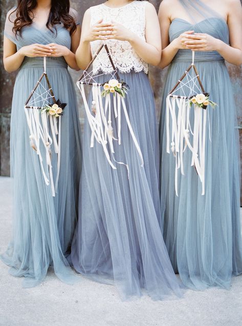 Boho brides, take note! This idea has your name written all over it. In this photo, we love how the mini dreamcatchers vibe with the flow-y bridesmaid dresses while also adding an alternative touch to an otherwise romantic look. Bouquet Alternatives, Bridesmaid Bouquet Alternatives, Alternative Bridesmaid, Dream Catcher Wedding, Wedding Ideas Unique, Alternative Wedding Bouquet, Modern Wedding Flowers, Unique Bridesmaid, Blue Bridesmaids