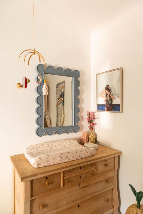 Bye Bye, Open Concept: When This Family Couldn’t Build An Addition, They * Added * Interior Walls (+ A Sweet Nursery Reveal) - Emily Henderson Baby Nursery Mirror, Eclectic Baby Nursery, Daycare Layout, Eclectic Nursery, Scalloped Mirror, Sweet Nursery, Living Tv, Baby Changing Table, Nursery Room Design