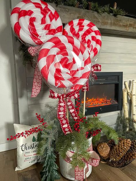 DIY Giant Candy Canes & Lollipops Christmas Decorations | eHow Diy Giant Candy, Candy Cane Lollipops, Giant Candy Cane, Christmas Candy Cane Decorations, Candy Decorations Diy, Giant Lollipops, Diy Christmas Candy, Candy Cane Decorations, Halloween Spider Decorations