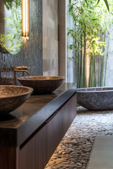 Embrace tranquility with these modern bathroom ideas. Featuring natural stone sinks, a pebble floor, and lush greenery, this design blends luxury and nature seamlessly. Perfect for a spa-like atmosphere at home. #ModernBathroomIdeas #BathroomDesign #HomeDecor West Indies Bathroom, Pebble Floor Bathroom, Modern West Indies, Poolhouse Bathrooms, Zen Spa Decor, Zen Bathroom Design, Micro Homes, Stone Sinks, Modern Bathroom Ideas