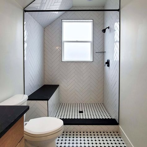 Bold patterns meet sleek design in this modern bathroom renovation! 🖤✨ From the striking black and white tile to the natural wood accents, this space is a perfect mix of style and function. Ready for a bathroom upgrade? Let OWSI bring your vision to life! 🚿 Flooring supplied and designed by: @owsiflooringanddesign Built by: @Summit_HomesUT #OWSIUSA #SummitConsturction #BathroomDesign #TileInspiration #ModernLiving #HomeRenovation Black Floor White Tile Bathroom, Black And White Bathroom Shower Tile, White Bathroom Shower Tile, Bathroom Tiles Ideas, White Tile Bathroom, Natural Wood Accents, Black And White Tile, Modern Bathroom Renovations, Bathroom Upgrade