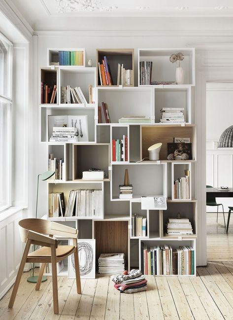 Scandinavian Bookcases and Shelving Units via Muuto Stacked System. Nordic and Scandi bookcases are a great place to add extra storage in an empty part of your home. Lots of people overlook bookshelves and shelving units when planning the design of their home, but you should give strong thought to this handy piece of storage furniture! Modern Home Library, Muuto Stacked, Minimalist Bookshelves, Bookshelf Design, Wood Bookcase, Scandinavian Interior Design, Shelving Systems, Bookshelf Decor, Scandinavian Interior