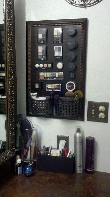 make-your-own-magnetic-makeup-board-cheap-frame by ailjkic,I would use a piece of sheet metal that you can get at any lowes or home depot and have it cut to the side of your frame. If you want it black you can paint it. also use heavy duty magnets that you use hot glued to the back of makeup to hold it on. For the baskets I might use the hooks made by 3m with adhesive on the back.