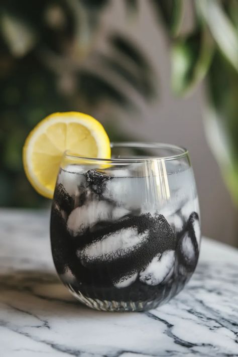 A photo of a  Charcoal Lemonade Detox a Detox drinks Charcoal Lemonade, Detox Lemonade, Easy Detox Drinks, Quick Detox, Healthy Gut Recipes, Gut Recipes, Infused Waters, Sip Sip Hooray, Cleanse Diet