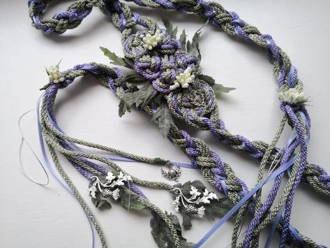 Create cherished memory of your special day with this sage green and lavender heirloom-worthy hand-fasting cord. Making for meaningful way of tying the knot, .this cord is made of double twisted cotton/viscose rope and adorned with decorative flowers and charms. Thistle Leaves, Lavender Wedding Colors, Wedding Knot, Witch Wedding, Wedding Cord, Wedding Coasters Favors, Wedding Ceremony Unity, Handfasting Cords, Pagan Wedding