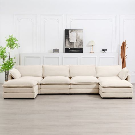 The sectional sofa is a type of furniture that combines the design and comfort of a sectional sofa with the texture and durability of corduroy fabric,consists of two or more connected seating modules, such as a sofa, loveseat, ottomans, which can be… Sofa Sectionals In Living Room, Sofa With Ottoman, Room Couches, U Shaped Sectional Sofa, Sectional Sofas Living Room, Fabric Sectional Sofas, Sectional With Ottoman, Modern Sofa Sectional, U Shaped Sectional