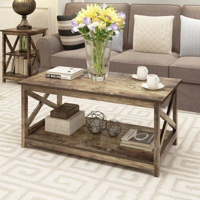 Coffee Table With StorageFeatures:Product Type: Coffee TableStools Included: NoTop Shape: RectangularTop Color (Color: White Oak): White OakTop Color (Color: Washed Oak): Washed OakTop Color (Color: Dark Walnut): Dark WalnutTop Color (Color: Rustic): RusticBase Color (Color: White Oak): White OakBase Color (Color: Washed Oak): Washed OakBase Color (Color: Dark Walnut): Dark WalnutBase Color (Color: Rustic): RusticTop Material: Manufactured WoodTop Material Details: Top Manufactured Wood Type: MD Farmhouse Coffee Tables, Modern Wood Coffee Table, Tier Shelf, X Coffee Table, Farmhouse Modern, Coffee Table Farmhouse, Rustic Coffee Tables, Shelf Storage, Cool Coffee Tables