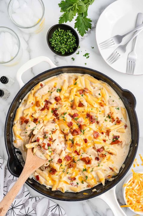 Crack Chicken Penne on a white table with parsley and cheese on the side. Chicken Penne, Princess Pinky Girl, Pinky Girl, One Pot Pasta Recipes, Smoked Bacon, Boneless Skinless Chicken Breast, Cream Of Chicken Soup, Skinless Chicken Breast, Chicken Dishes