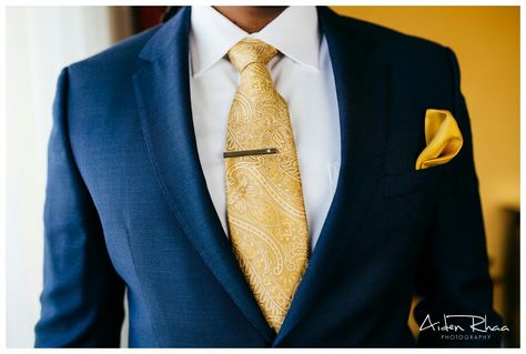 Navy suit & gold tie Navy Suit Gold Tie Wedding, Blue And Gold Tuxedo Wedding, Navy Blue Suit With Gold Tie, Navy Suit With Gold Tie, Navy Blue And Gold Tuxedo Wedding, Navy Blue And Gold Suit Men, Tie With Navy Blue Suit, Navy Suit Gold Tie, Blue And Gold Wedding Suit