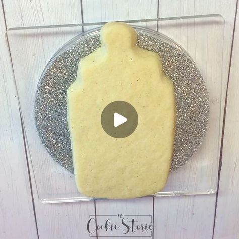 A Cookie Storie on Instagram: "Happy Saturday 🙃 Cookie cutter is from @annclarkcookiecutters. Icing squiggles are to prevent the icing from cratering. Icing tips used were Ateco 136, @wiltoncakes 18 & 16. & cookie turntable is from @thesweetesttiers. • • • • • #sugarcookies #customsugarcookies #decoratedcookies #decoratedsugarcookies #acookiestorie #cookiedecorating #royalicing #royalicingcookies #royalicingart #instacookies #bakersspotlight #talentedcookiers #cookiesofinstagram #cookiegram #cookieinspo #cookiedecorator #cookieoftheday #cookievideo #cookiedecoratingvideo #cookietutorial #babyshowercookies #babybottlecookies" Banner Cookies Decorated, Baby Bottle Cookies Decorated, Oh Boy Cookies, Gift Cookies Decorated, Cookie Turntable, Baby Shower Royal Icing Cookies, Cookie Decorating Videos, Sugarbelle Cookies, Baby Bottle Cookies