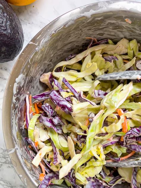 Slaw for Fish Tacos is a delicious creamy and tangy topping for fish tacos or fish taco salad. Make a big batch and add it to meals all week.