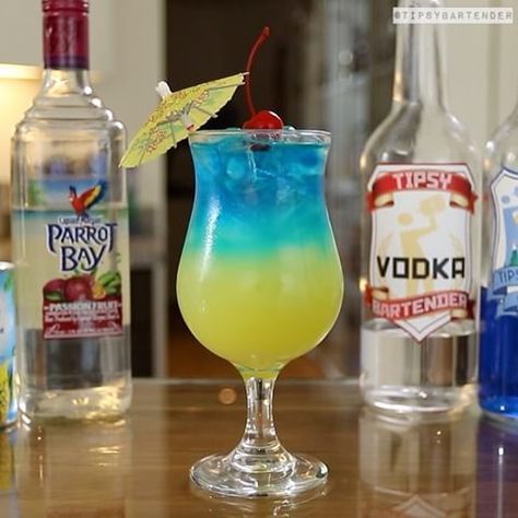 TROPICAL STORM 🍒🍍 Yellow Layer: 1 1/2 oz. (45ml) Passionfruit Rum 3 oz. (90ml) Pineapple Juice Blue Layer: 1 oz. (30ml) Vodka 1/2 oz. (15ml) Blue Curacao #vodka #rum #cocktail #drink... Vodka Mixers, Tropical Drink Recipes, Fruity Alcohol Drinks, Malibu Drinks, Summer Vodka Cocktails, Alcholic Drinks, Cocktail Umbrellas, Tipsy Bartender, Jungle Juice