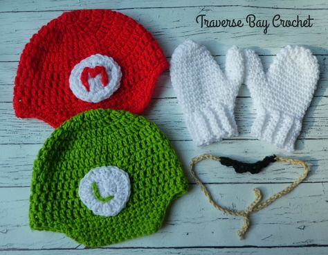 Mario and Luigi hat, mustache, mitten crochet costume | Mario And Luigi Hats, Mitten Crochet, Crochet Dinosaur Hat, Crochet Mario, Luigi Hat, Mario Crochet, Luigi Costume, Crochet Animal Hats, Stuff Toys