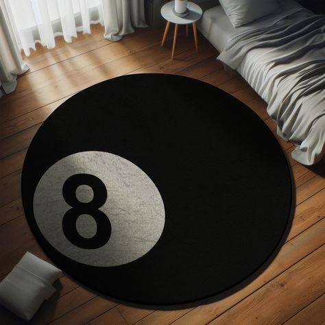 Make a Bold Statement with Our Exclusive 8 Ball Rug Transform any room into a space of intrigue and style with our 8 Ball Rug. Perfectly round, featuring the iconic 8-ball design, this rug is a must-have for anyone looking to add a touch of cool, contemporary flair to their home. Whether you're decking out a game room, adding personality to your living space, or gifting something unique, our 8 Ball Rug is sure to impress. Why Our 8 Ball Rug? Striking Design: With its bold 8-ball imagery and deep 8ball Room Decor, Cute Rugs For Bedrooms, 8 Ball Carpet, Streetwear Room Ideas, 8ball Rug, Cool Carpets, Streetwear Room, 8 Ball Rug, Cool Rug