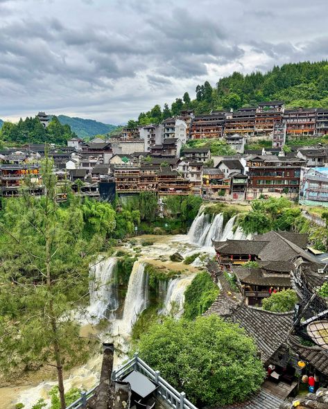 I had an incredible visit to Furong Town in China. This ancient town, also known as Hibiscus Town, is nestled among lush mountains and boasts stunning waterfalls right in the center of the village. The history here dates back over 2,000 years, and the Tujia ethnic culture is beautifully preserved. Walking through its stone-paved streets, I felt like I was stepping back in time. Definitely a must-see destination for anyone looking for an ancient town in China. 🌸 #FurongTown #HibiscusTown #Anc... Furong Town, Lush Mountains, Back In Time, The Village, The History, In Time, Hibiscus, Lush, Dates